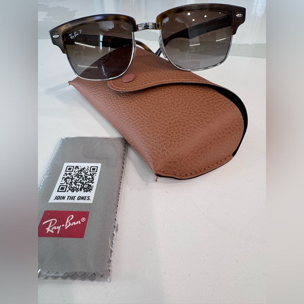 Ray-Ban sunglasses.